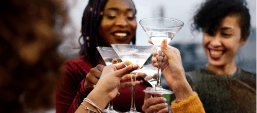 Friends toasting Martinis at Brio Italian Grille