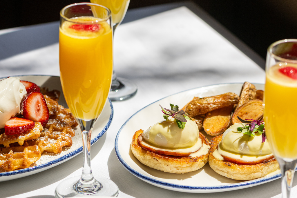 Waffles and benedicts with mimosas